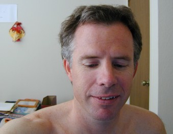 me, in front of the computer